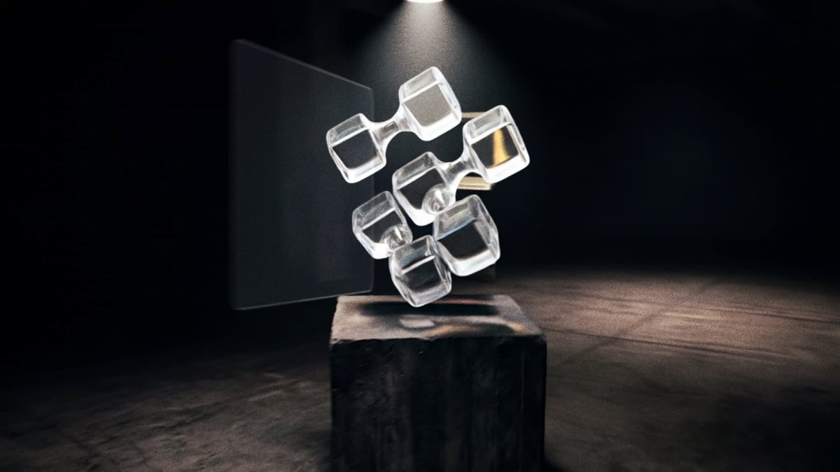 The shattered hardware reforms as a luminous glass molecule — seven crystal cubes locking into Cognition's logo, refracting the spotlight into soft caustics across the plinth.