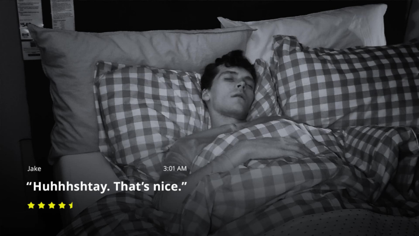 Jake mutters a drowsy “That’s nice” in his sleep, unknowingly endorsing his IKEA mattress at 3:01 AM.