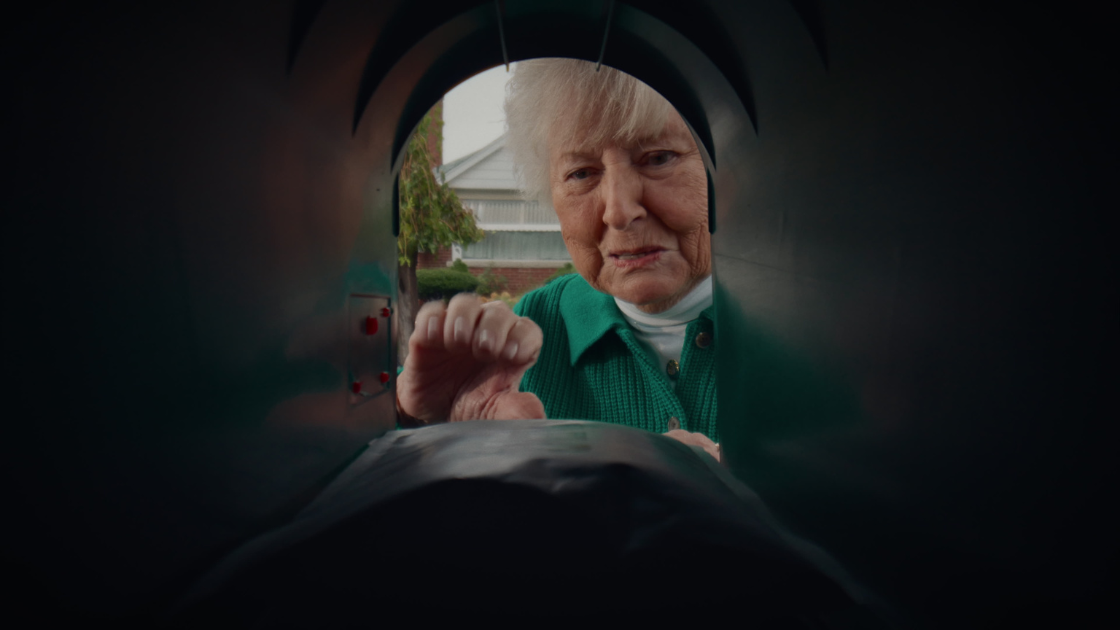 A grandmother retrieving a Jewlr package from her mailbox.