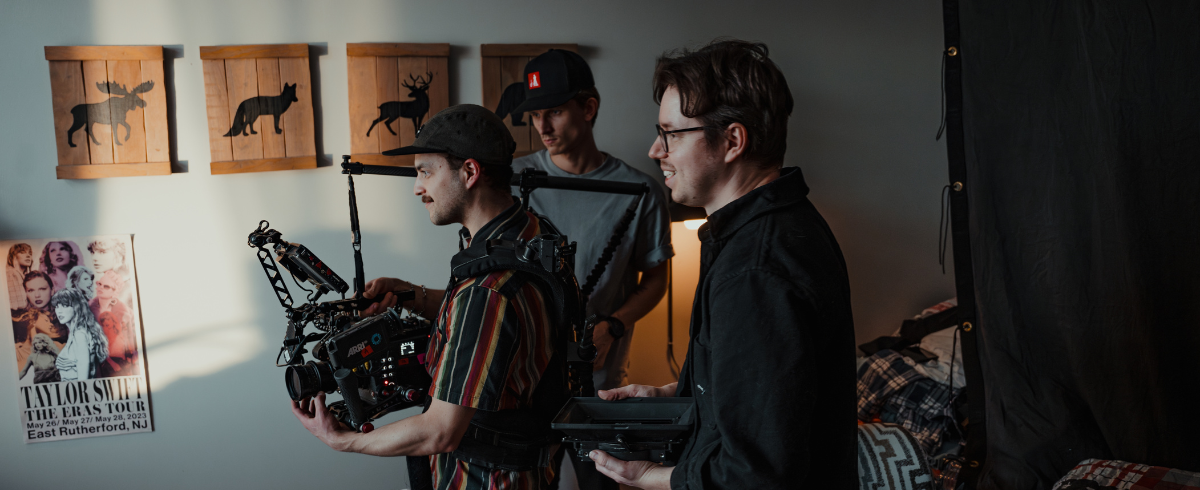 The director and crew in action, filming a scene inside the leukemia patient's house.