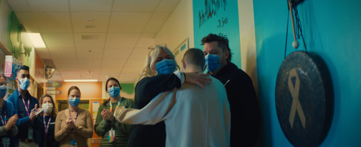 The leukemia patient celebrating with her family in the hospital.