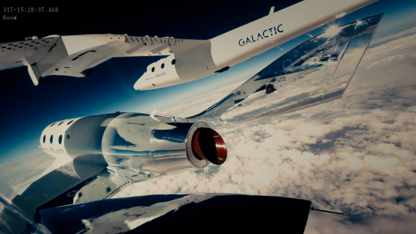 A Virgin Galactic spacecraft soars above the clouds, reflecting the curve of Earth.